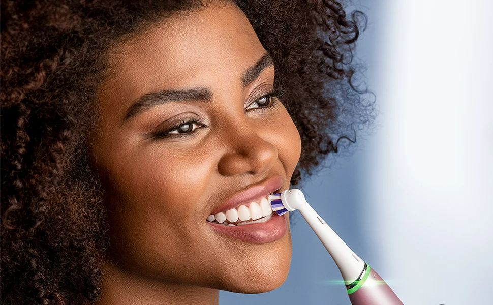lady brushing her teeth