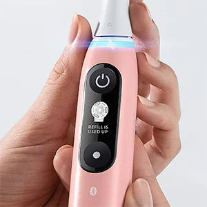 radiant white brush brushing tooth