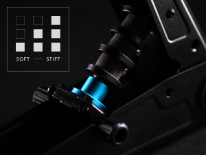 Close-up detail shot of black mechanical or electronic component with blue accent light visible.