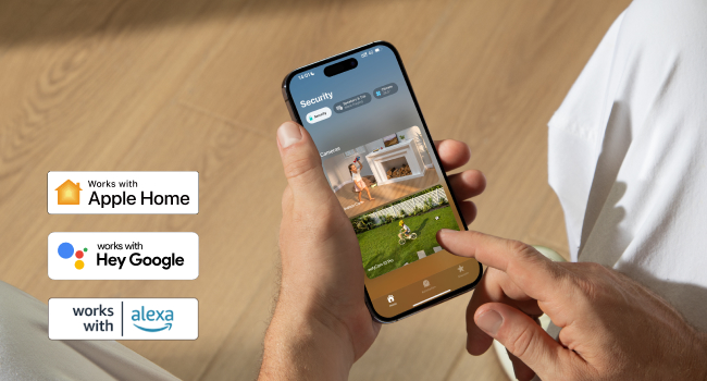Smartphone displaying smart home interface with Apple Home, Hey Google, and Alexa compatibility logos shown at bottom.