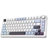 Compact mechanical keyboard with RGB backlighting. Black keys on a dark frame, displaying a colorful spectrum across the keys. Features a minimalist design without a number pad.