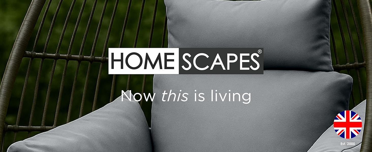 Text reads 'HOMESCAPES' and 'Now this is living'. Garden sprinkler product shown in use on green lawn creating water patterns.