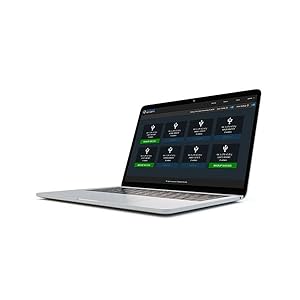 Close-up of a camera lens with multicolored aperture blades visible inside. Black circular frame surrounds the glass element.