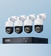 Security camera system with four bullet-style cameras and a central DVR unit shown against light gray background.