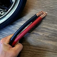 a red and black cable with a black wire attached to it.