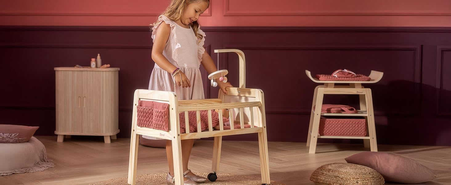 Interior scene showing wooden furniture including what appears to be a chair and table against a dark burgundy wall.
