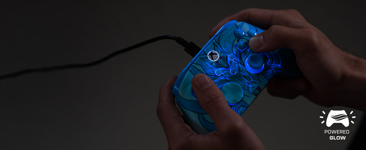 Series of images showing hands interacting with a blue illuminated gaming controller or device in low-light conditions.