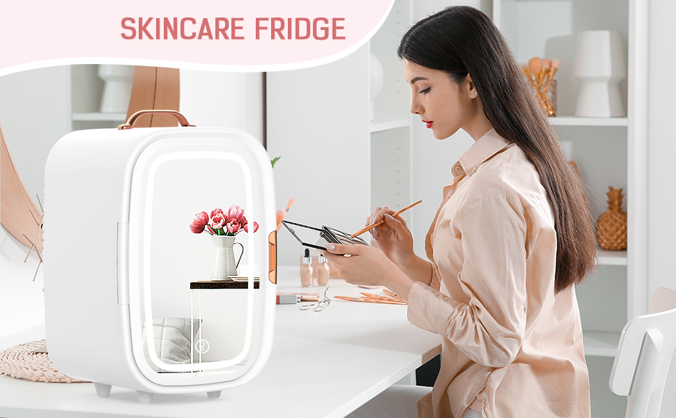 Text reads: 'SKINCARE FRIDGE'. Shows compact white mini-fridge for beauty products with person checking contents.