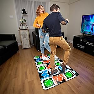 Multiple views of people playing on an electronic dance mat with colorful light-up squares. Mat displays bright blue, red, and green illuminated panels on dark floor surface.