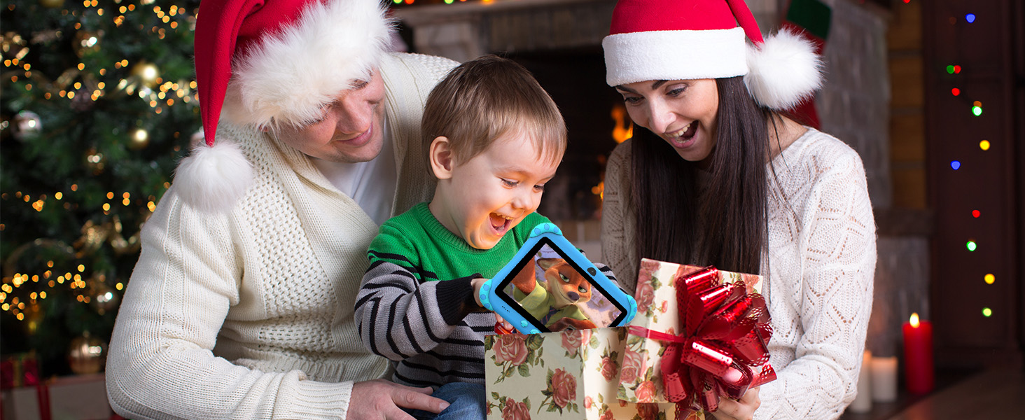 Holiday scene with a child holding an electronic device, surrounded by wrapped presents and Christmas decorations with tree lights in background.