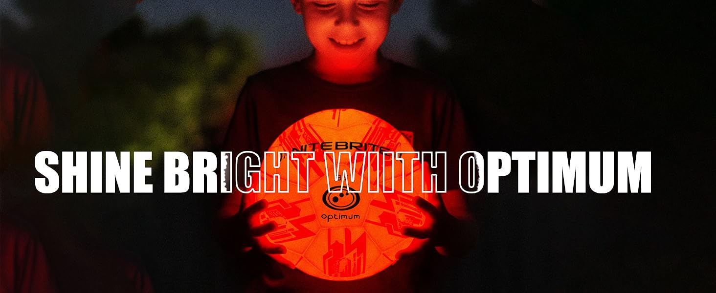 Text: 'DON'T LET THE NIGHT STOP YOUR GAME!' Soccer/football field at night with glowing orange ball in foreground.