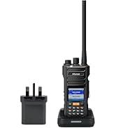 Purple plastic device showing grid of pictogram symbols or buttons, appears to be an assistive communication board with handle on right side.