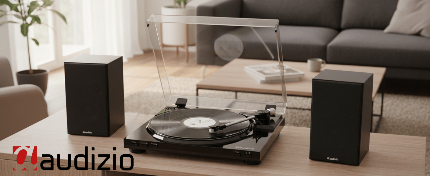 Text reads 'audizio'. Modern living room setup showing audio equipment including turntable and speakers arranged on furniture with neutral toned decor.