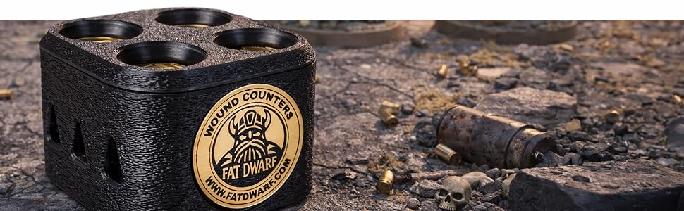 Black metal ring holder or display with gold medallion emblems embedded. Multiple views showing circular compartments for ring storage.