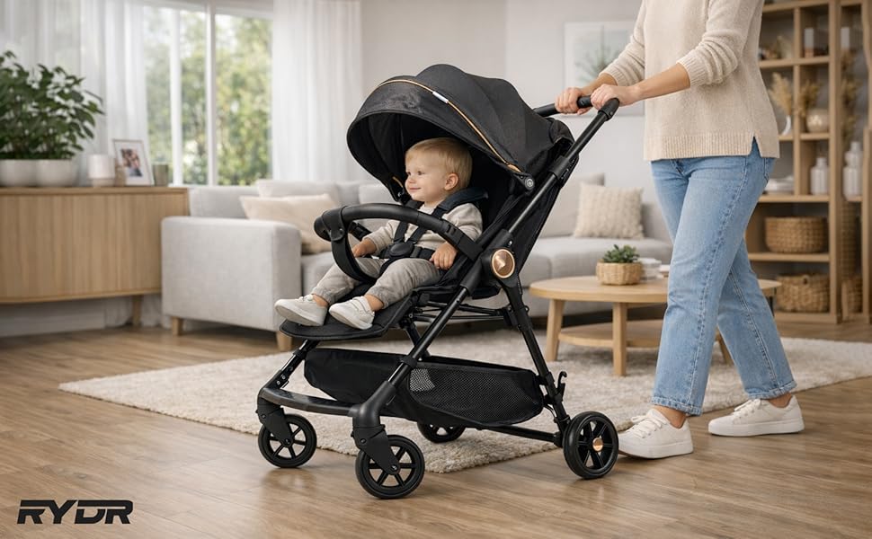Text reads 'RYDR'. Series of images showing black baby stroller demonstration in home setting, displaying folding mechanism and mobility features on hardwood floors.