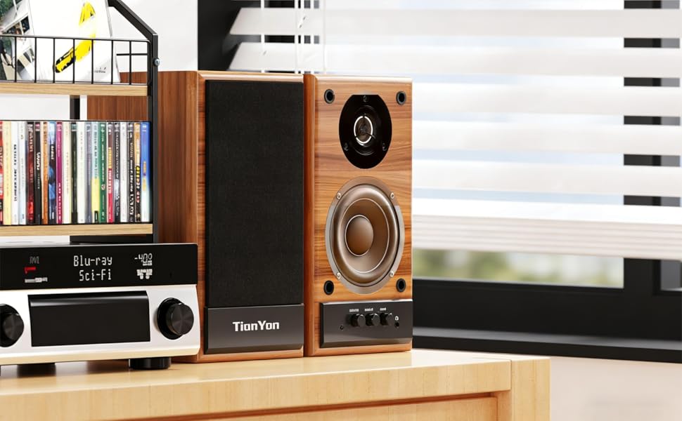 Modern home entertainment setup with wooden shelf displaying speakers and audio equipment against white horizontal blinds.