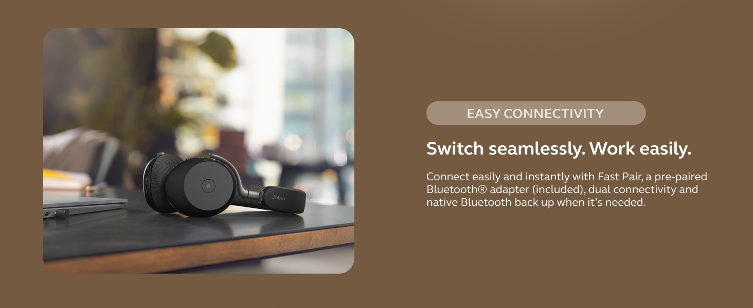 Text reads 'Switch seamlessly. Work easily.' Product advertisement showing over-ear headphones and laptop in brown-toned professional setting.