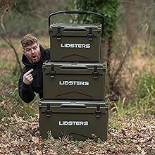 Text reads 'LIDSTERS'. Military-style olive green storage container or cooler with handles and latches, shown in outdoor setting.