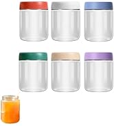 Glass storage jars with bamboo lids, reusable straws, cleaning brush, and silicone straw tips. Set includes two sizes of jars, metal and glass straws, and accessories for eco-friendly beverage storage.