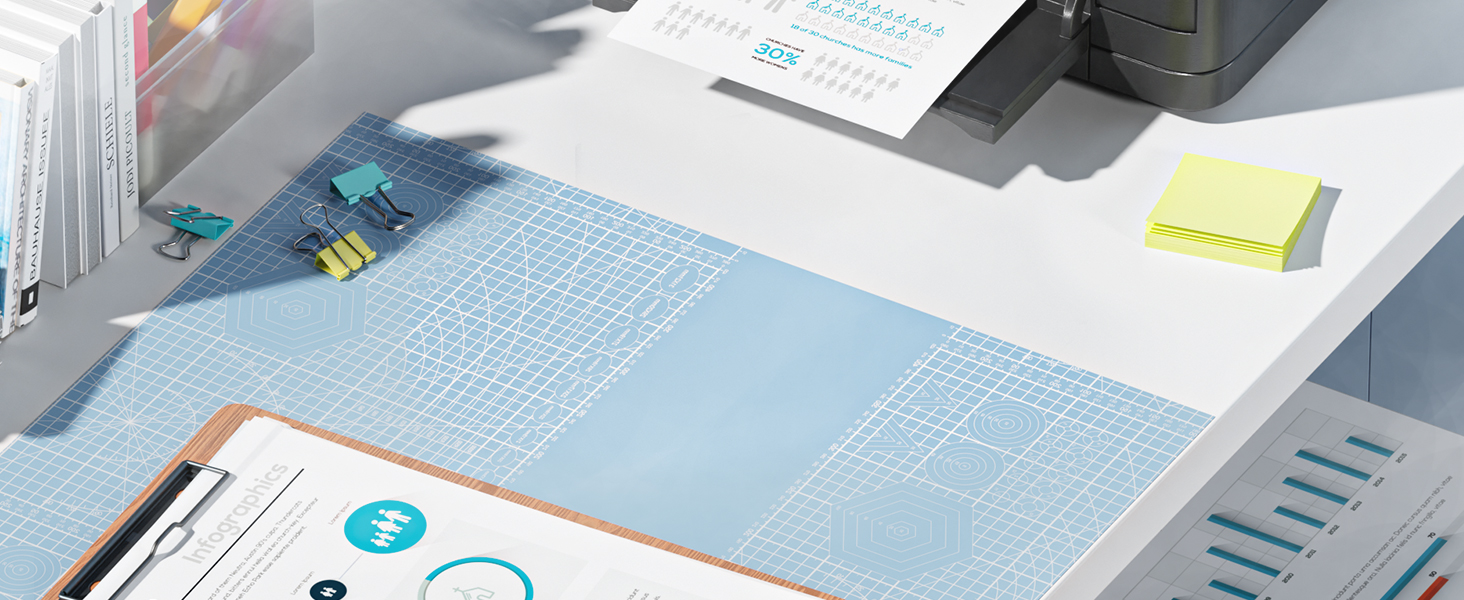 Business documents and paperwork spread across a surface, showing various charts, graphs and printed materials in blue and white colors.
