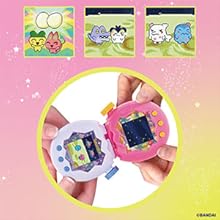 Text reads 'ZOOM!!' Digital toy device displayed in hand against colorful circular background with game cards and space-themed graphics.