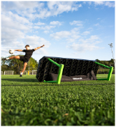 White soccer ball with black geometric patterns and 'QUICKPLAY' text prominently displayed. Ball rests on green surface, suggesting artificial turf or grass.