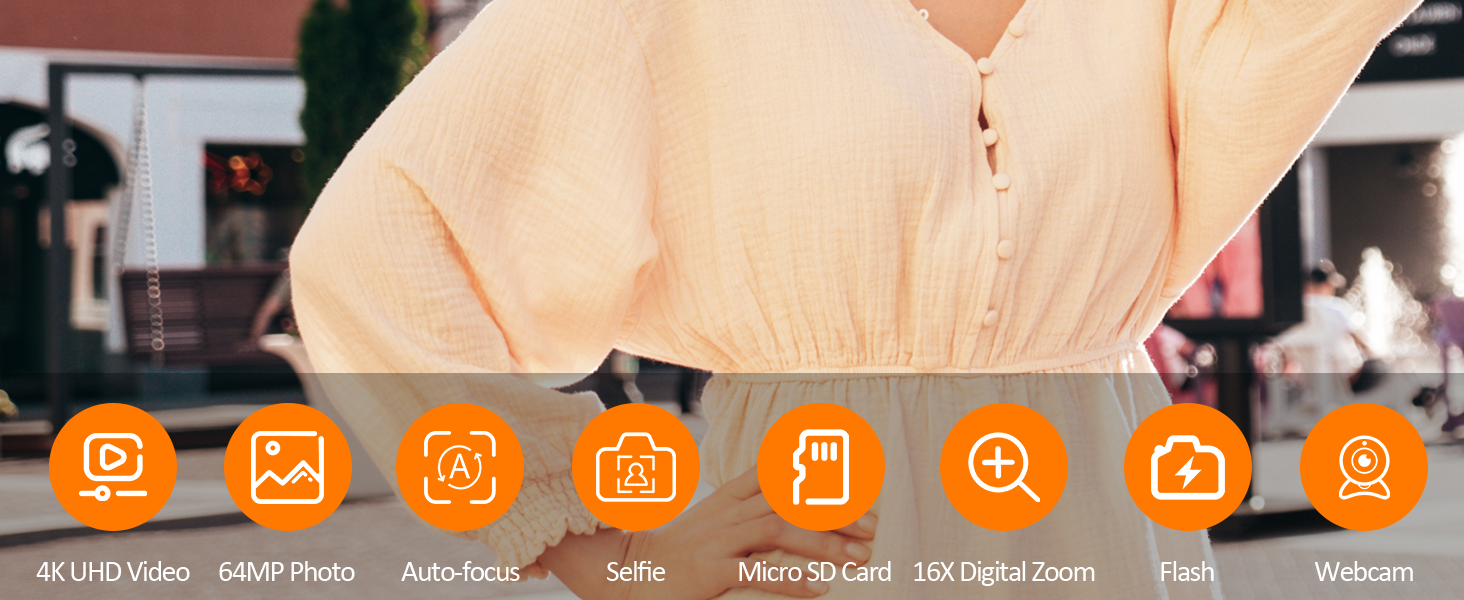 Bottom portion of person wearing beige/tan colored sleeveless top showing shoulder and torso area. Orange circular icons with symbols displayed in a row below, indicating various features or functions.