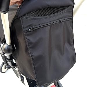 Gray fabric protective carrying case with mesh pockets and handle, shown open displaying interior organization compartments.