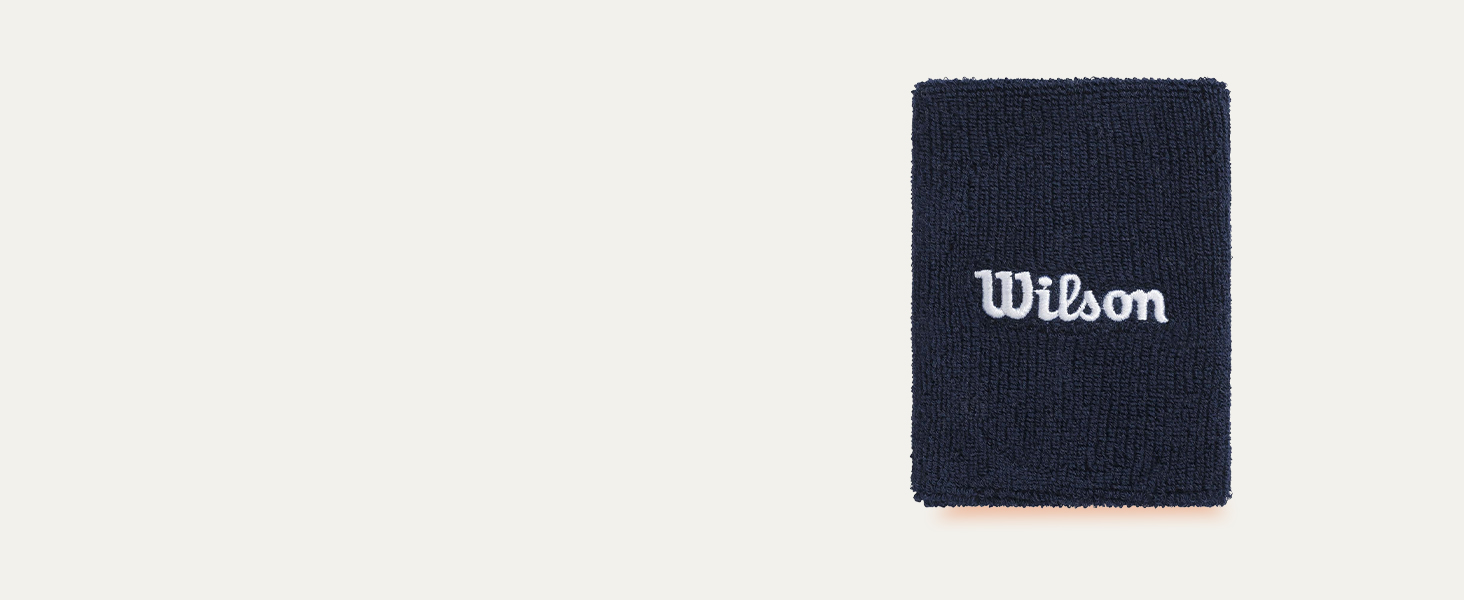 Text reads 'Wilson'. Navy blue wristband or sweatband with Wilson brand logo embroidered in white.