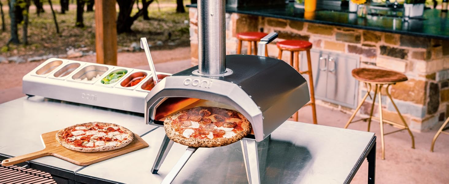 a pizza oven with a pizza inside of it.
