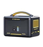 Black rectangular electronic device with LED indicators and yellow safety marking visible on the corner.