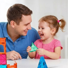Text reads 'DEVELOPS LOGIC & PROBLEM SOLVING'. Educational illustration showing colorful building blocks, geometric shapes, and learning concepts with icons.
