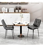 Modern dining room set featuring round white table with black base and gray upholstered chairs, shown from multiple angles in minimalist setting.