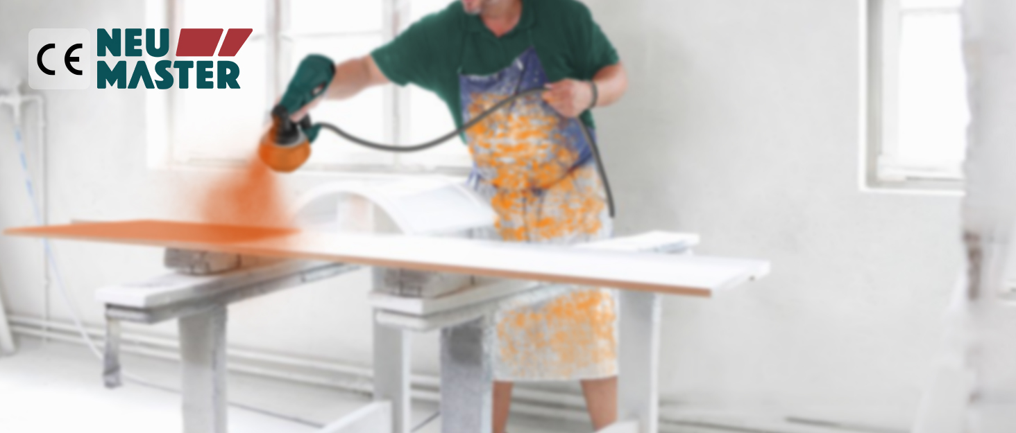 a person using a machine to cut wood