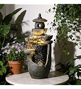 Close-up view of the oriental lantern fountain showing detailed water flow pattern and warm LED lighting effect against a neutral background.