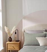Text reads: 'duvets', 'Discover duvets for every season from lightweight summer duvets to snuggly winter warmers to help you get the best out of bedtime.' Images show bedding in use.