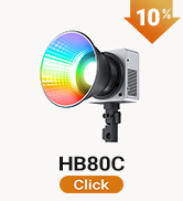 Text reads 'FS150B', 'Click'. Compact black and gold LED work light with adjustable head and mounting bracket, approximately 150 watts, designed for task lighting.