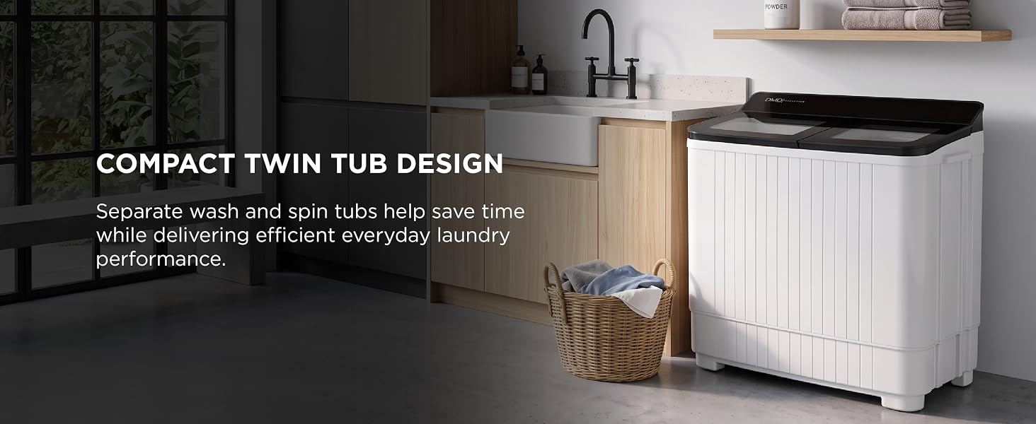 White compact washing machine with black top lid positioned in modern laundry room with wooden storage shelves, gray wall, and glass doors with window panes visible.