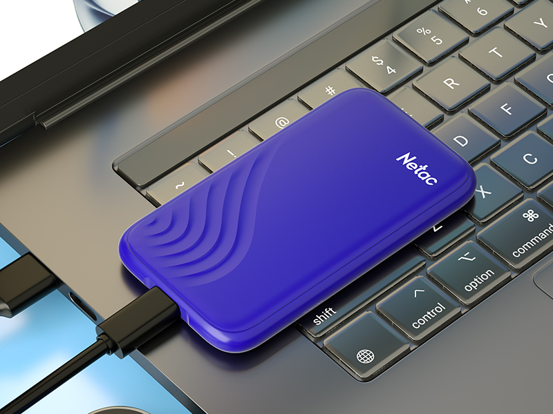 Mobile phone or portable device with blue and gradient color design on charging cable. Device angled diagonally against light blue background with motion effects.