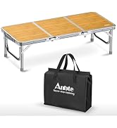 Portable folding table with bamboo-style top surface, aluminum frame, and lower storage shelf. Shows table both assembled and folded compact.