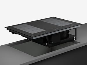 Black rectangular heated massage table or platform with embedded heating elements and control panel, shown with shadow against white background.